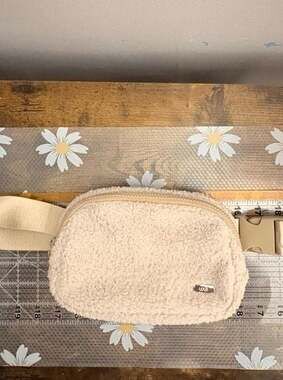 Lolë Cozy Fleece Belt Bag in Cream Beige Sherpa